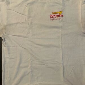Gunthers Supply Co. White Tee with Yellow & Red Arrow Logo